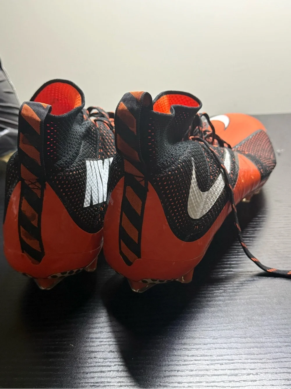 Nike Black and Orange Soccer Cleats with White Swoosh